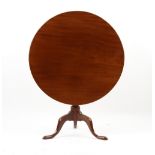 Property of a gentleman - a re-polished George III circular tilt-top occasional table with turned