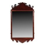 Property of a gentleman - a mid 18th century George II/III mahogany fretwork framed wall mirror,