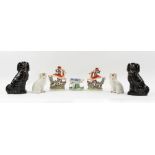 Property of a gentleman - two pairs of Victorian Staffordshire models of seated spaniels, the taller