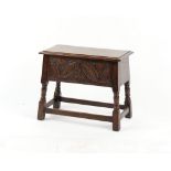 Property of a deceased estate - a reproduction oak box stool, with carved front & turned supports,