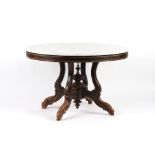 Property of a deceased estate - a 19th century black painted oval centre table with white marble