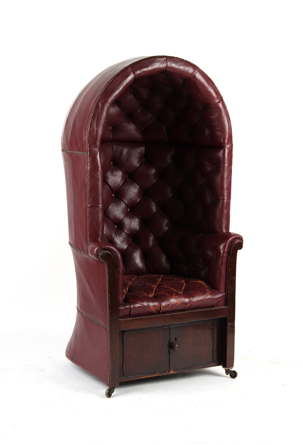 Property of a lady - a mahogany & red leather button upholstered porter's chair, elements 19th