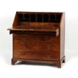 Property of a lady - a mid 18th century George II walnut fall-front bureau, with fitted interior