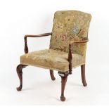 Property of a gentleman - a George II style armchair with floral gros point needlework upholstery.