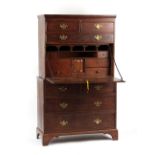 Property of a gentleman - a George III oak two-part secretaire chest, the fall enclosing fitted