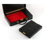 Property of a lady - a good quality black leather jewellery case with Bramah type locks (no key),