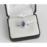A fine 18ct white gold & platinum certificated Ceylon sapphire & diamond pear shaped cluster ring,