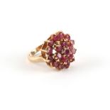 Property of a lady - a 9ct yellow gold ruby cluster ring, size P, approximately 7.1 grams.