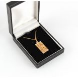 Property of a gentleman - a 1940 Battle of Britain commemorative 9ct gold & diamond ingot pendant on