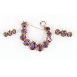 Property of a lady - a Victorian unmarked yellow gold amethyst ten stone oval panel bracelet,