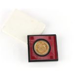 Property of a lady - gold coin - a 1975 Singapore 10th Anniversary 500 Dollar commemorative gold