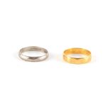 Property of a lady - a 22ct yellow gold wedding ring, approximately 2.8 grams, size L; together with