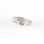 Property of a deceased estate - a platinum diamond two row half eternity ring, approximately 7.0