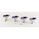Property of a deceased estate - a set of four George III silver navette shaped pedestal salts with