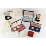 Property of a gentleman - coins - six cased collector's coins or coin sets, mostly silver, including