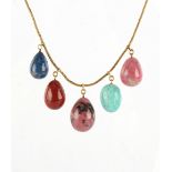 An unmarked 18ct yellow gold (tested) hardstone necklace, with five various pear shaped pendants