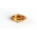 A late Victorian 15ct yellow gold citrine & seed pearl brooch, the oval cut citrine measuring