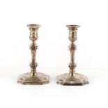 Property of a deceased estate - a pair of silver candlesticks, in the early 18th century style,