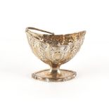Property of a deceased estate - a George III silver sugar basket of navette form, with swing handle,