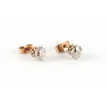 Property of a lady - a pair of diamond stud earrings, the estimated total diamond weight 1.53 carats