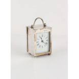 Property of a lady - an Edwardian silver cased boudoir carriage clock timepiece, with engraved
