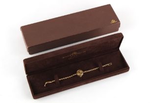 Property of a lady - a lady's Baume & Marcier 14ct yellow gold cased wristwatch, with 17-jewel