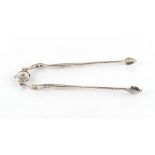 Property of a gentleman - an unusual pair of Georgian silver sugar nips with sprung mechanism,