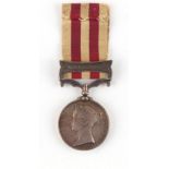 Property of a lady - a QV Indian Mutiny Medal 1857-59 with clasp for Lucknow, awarded to William