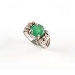 Property of a deceased estate - an Art Deco style 14ct white gold emerald & diamond ring, the