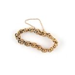 Property of a lady - a 15ct gold fancy chain link bracelet, approximately 18.7 grams.