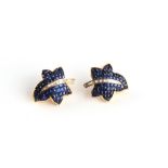 A pair of 18ct yellow gold sapphire & diamond leaf earrings, the calibre cut sapphires weighing an