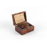 Property of a lady - a small leather box containing a lock of hair belonging to Prince Leopold,
