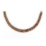 A good silver gilt multi gem set necklace, with three rows of various coloured oval cut gemstones,