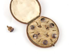 The Henry & Tricia Byrom Collection - a cased set of six 9ct gold & mother-of-pearl buttons with
