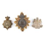 Property of a gentleman - a group of three military badges including a William IV shako plate, circa