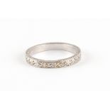 Property of a deceased estate - a platinum wedding ring, with engraved decoration, approximately 6.1