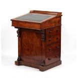 Property of a lady - an early Victorian mahogany davenport with sliding top.