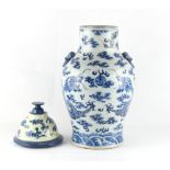 Property of a gentleman - a 19th century Chinese blue & white baluster vase decorated with two