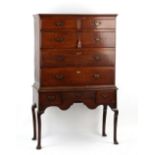 Property of a deceased estate - an 18th century George III oak chest on stand, with cabriole legs,