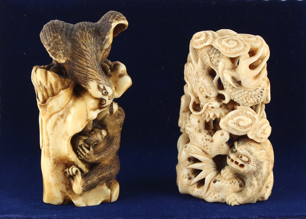 Property of a lady - two late 19th century Japanese carved bone okimono, one depicting a monkey