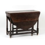 Property of a deceased estate - a late 17th / early 18th century oak oval topped gate-leg table with