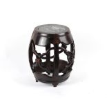A late 19th century Chinese carved hongmu drum seat with inset dreamstone circular panel, 20.