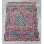 Property of a gentleman - an early 20th century Kashan rug, with red ground, 73 by 54ins. (188 by