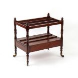 Property of a lady - a Victorian mahogany three division canterbury, with end drawer, on turned legs