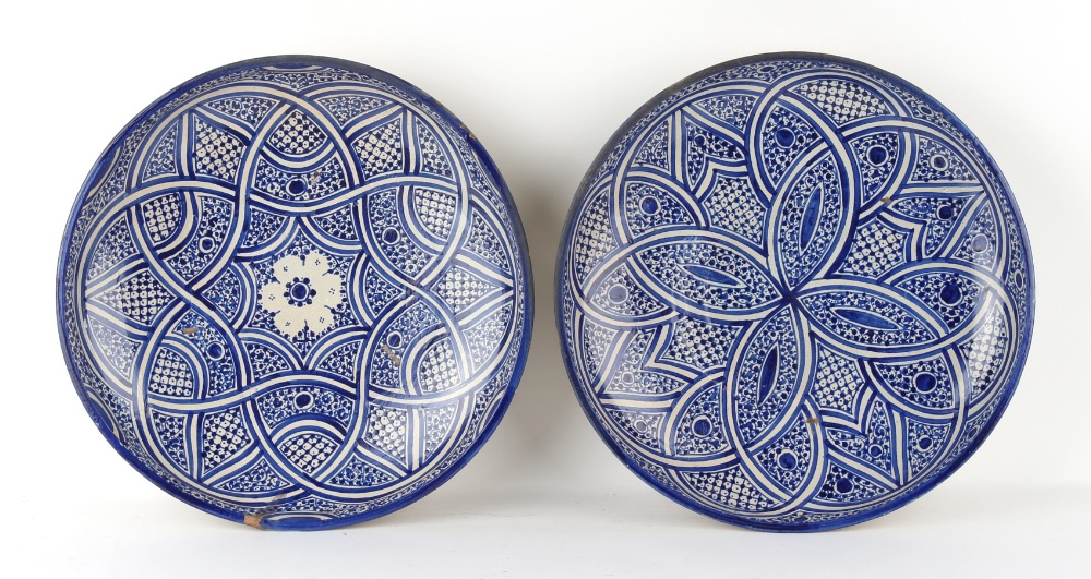 Property of a lady - a large pair of Moroccan Fez blue & white pottery shallow dishes, each