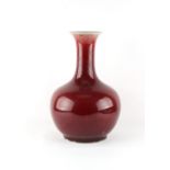 Property of a gentleman - a Chinese sang de boeuf flambe bottle vase, 18th / 19th century, 13.