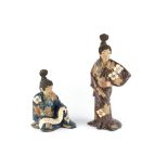 Property of a lady - two late 19th century Japanese glazed pottery figures, one modelled standing,