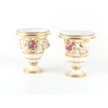 Property of a lady - a pair of 19th century French porcelain urn vases, with mask handles &
