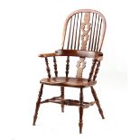 Property of a lady - an elm seated high-back Windsor elbow chair, late 20th century, with turned