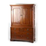 Property of a gentleman - a George III oak housekeeper's cupboard or linen press cupboard, in two